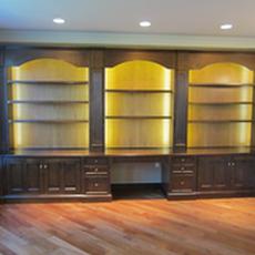 Maple library with cherry backs - Built-in library with lighting